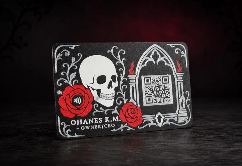 Custom gothic-style Kayem.co business card with a skull and roses design, QR code, and tap symbol
