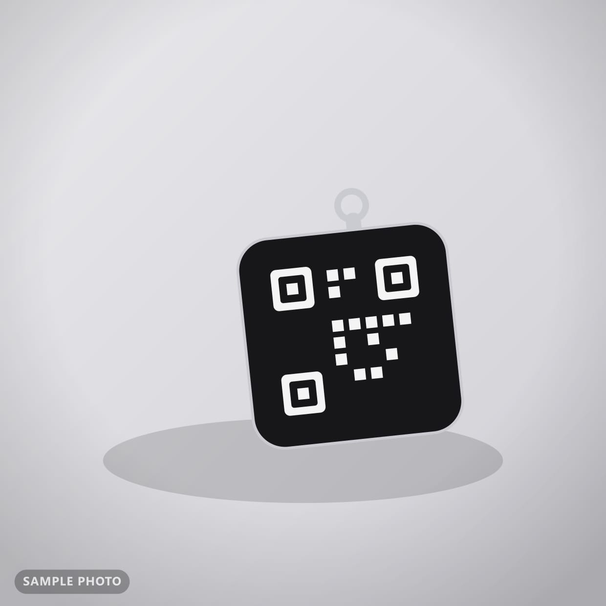 A handmade QR code keychain by Kayem.co
