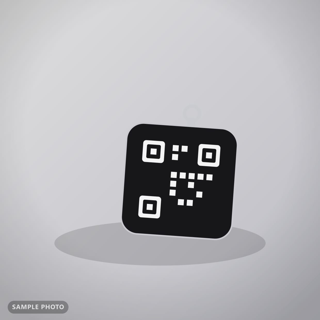 A handmade QR + NFC tap keychain by Kayem.co